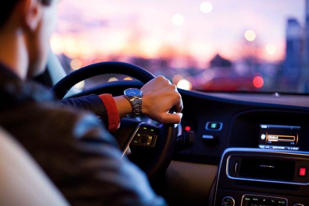 Marketers can tap the drive time hours for radio advertising Driver listening to radio